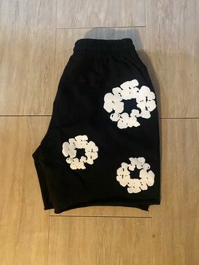 Black Men’s Denim Tear Shorts with White Floral Print
